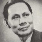 A black and white photo of a person from the 20th century