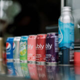 An arrangement of canned and bottled beverages