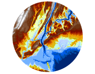 A circular image of topographical features, such as a blue river, sea, and the land that surrounds it depicted in brown.