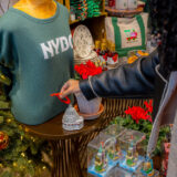 A person shops in a holiday-themed giftshop