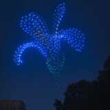 Drones depict an iris in the sky during Starry Nights