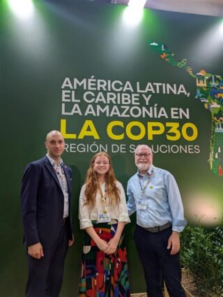 Three people at COP30 in Brazil.