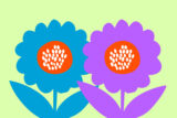 Blue and purple flowers against a green backdrop