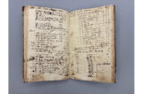 An open ledger of garden notes on lined paper