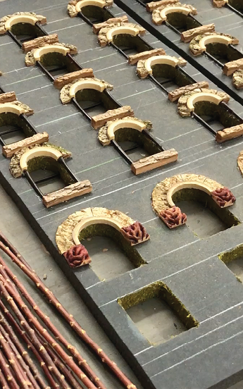 View of the construction of replica fa ade made of plant parts