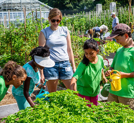One World Trade Center replica in construction being held in an artist s hand