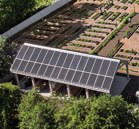 One World Trade Center replica in construction being held in an artist s hand